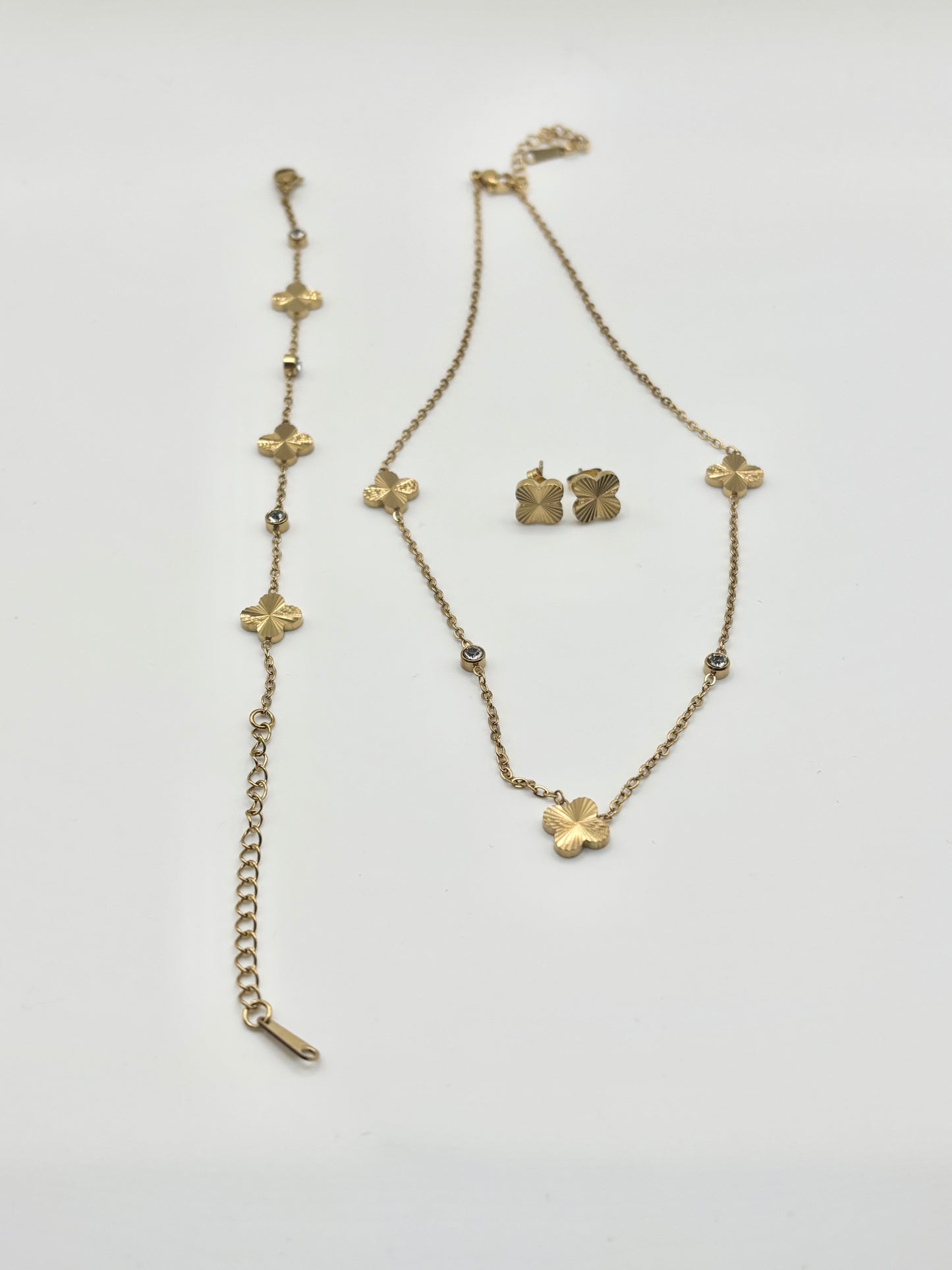 Parure trèfle doré – acier inoxydable